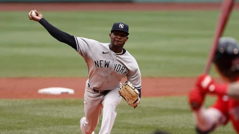 New York Yankees' Domingo German delivers a pitch against the...