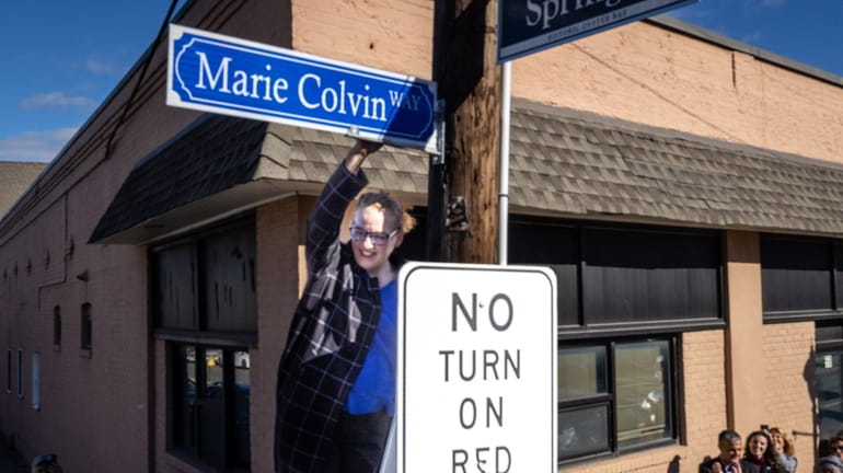 Marie Colvin's sister, Cat Colvin, on Saturday unveiled the new sign between...
