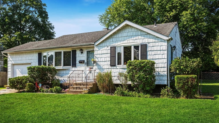 This three-bedroom house in East Patchogue is listed for $349,990. 