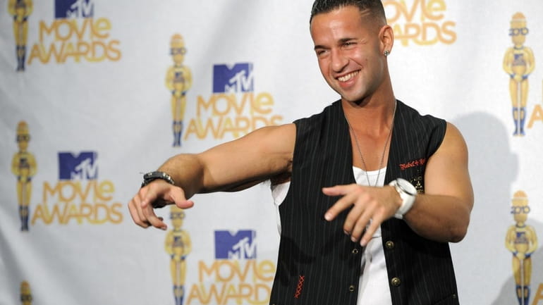 Mike Sorrentino, aka "The Situation,from"Jersey Shore," poses backstage at the...