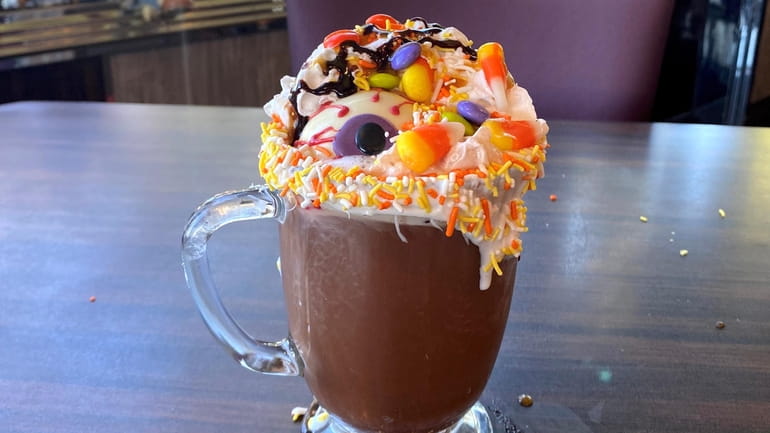 A seasonal hot chocolate with an embellished hot cocoa “bomb”...