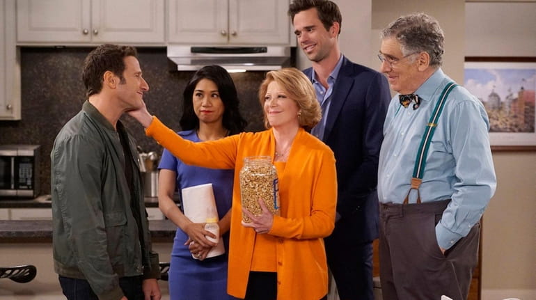 CBS' latest sitcom, "9JKL," stars Mark Feuerstein and premieres Monday,...