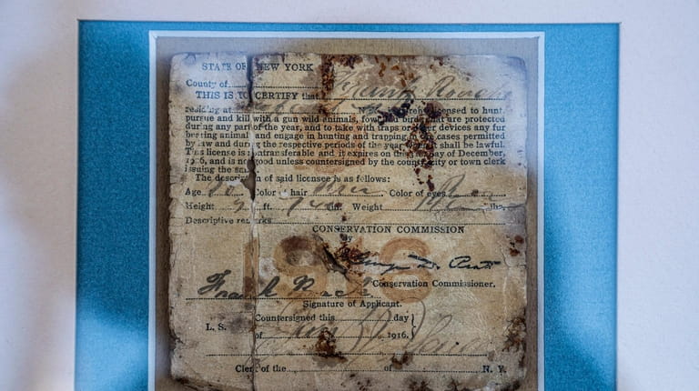 A photo of Frank Roach's New York State hunting license,...