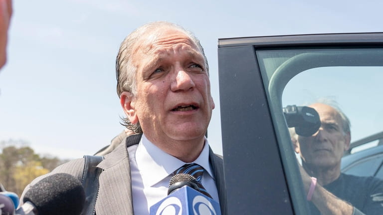 Former Nassau County Executive Edward Mangano leaves court after being...
