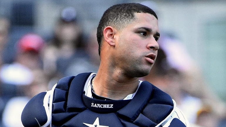 New York Yankees catcher Gary Sanchez looks on against the...