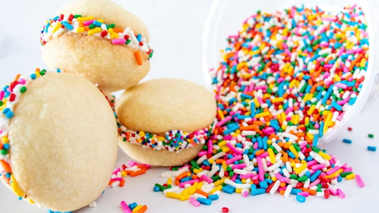 "Confetti" sugar cookies, filled with vanilla cream, are among the...