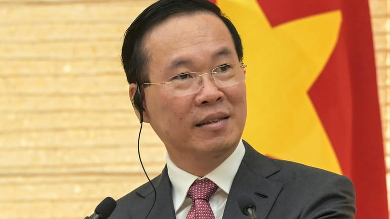 Vietnam's President Vo Van Thuong addresses the media during a...