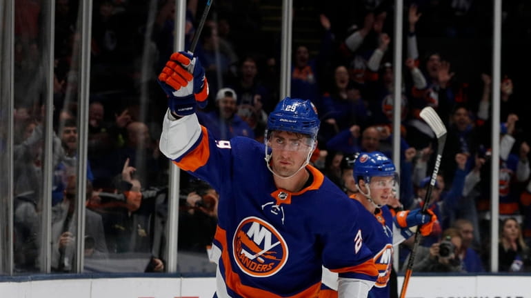 Brock Nelson #29 of the New York Islanders celebrates his...