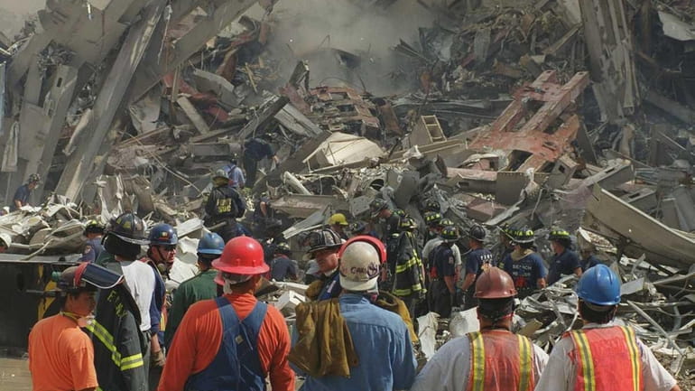 Rescue workers at the World Trade Center on Sept. 12,...