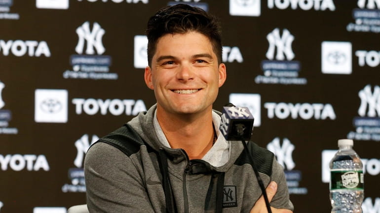 Andrew Benintendi of the Yankees speaks to the media before a game...