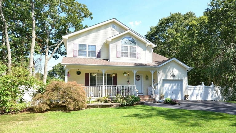 Priced at $475,913, this Flower Road Colonial has hardwood and...