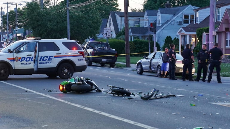 Nassau County police at the scene of a fatal motorcycle...