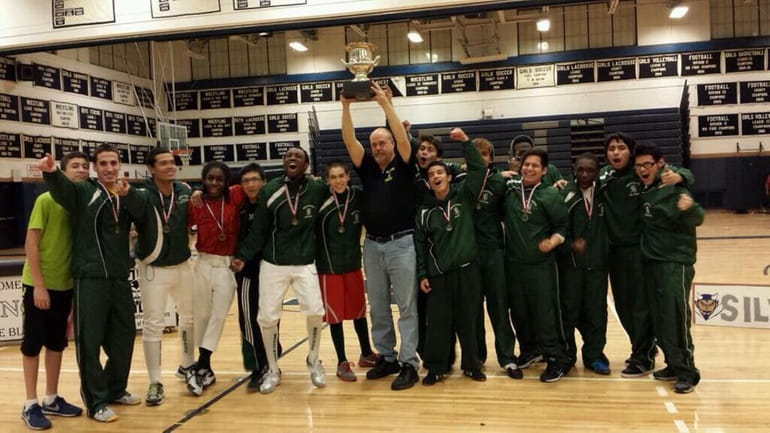 Coach Mike Corona (holding trophy) and the Brentwood boys fencing...