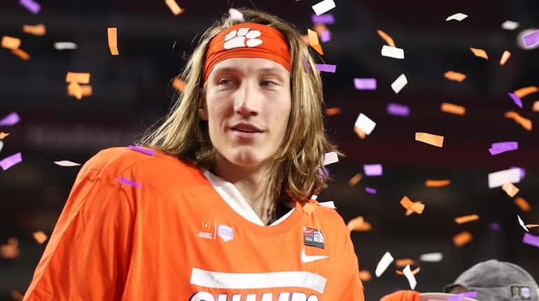 Trevor Lawrence  of the Clemson Tigers celebrates a 29-23 win...
