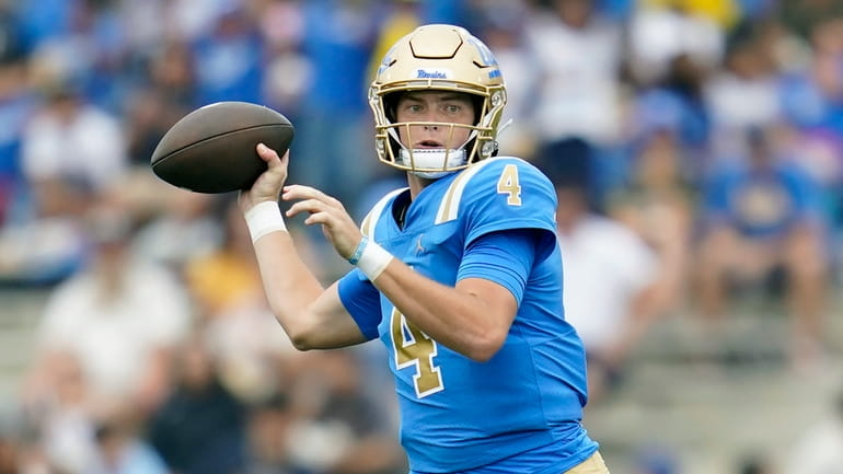 UCLA quarterback Ethan Garbers throws during the team's NCAA college...
