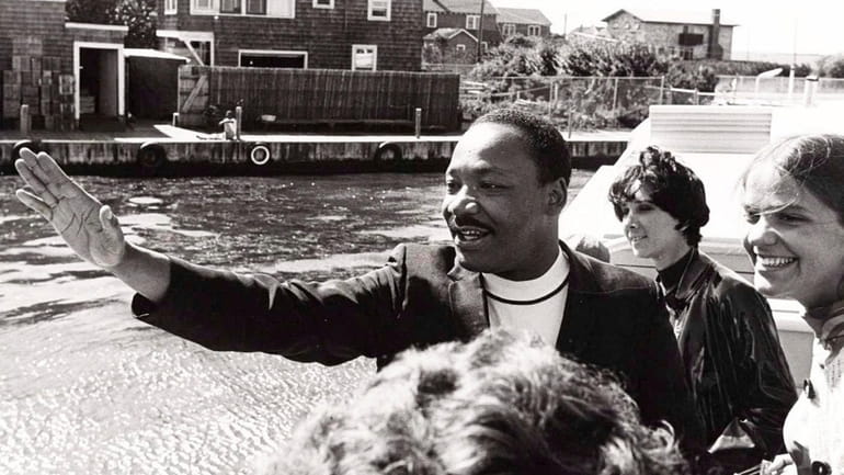 The Rev. Martin Luther King Jr. greets well-wishers Sept. 2,...