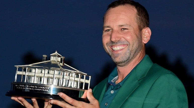 Sergio Garcia of Spain celebrates with the Masters Trophy during...