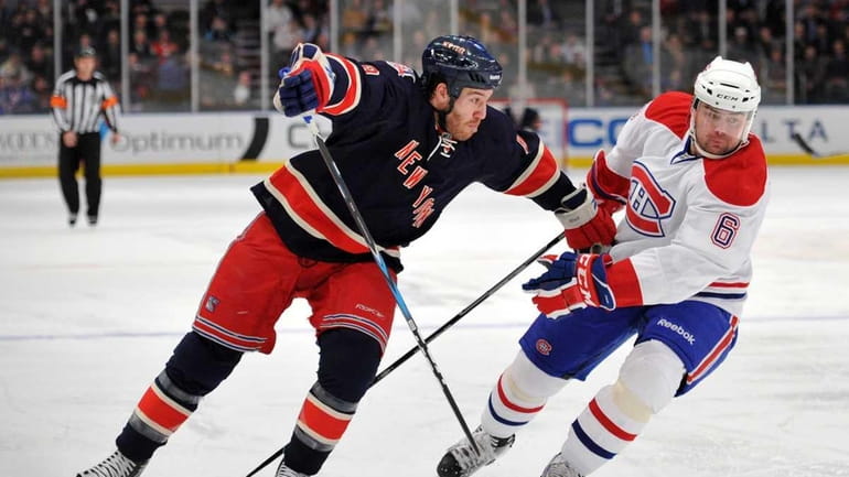 New York Rangers left wing Brandon Prust (8) and Montreal...