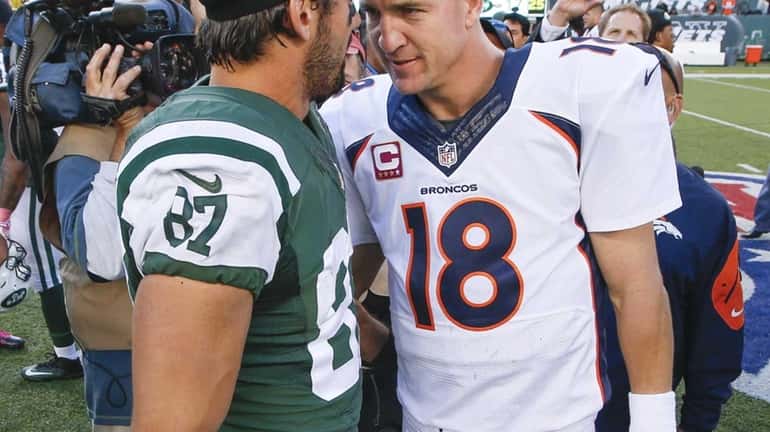 Jets wide receiver Eric Decker (87) and Denver Broncos quarterback...