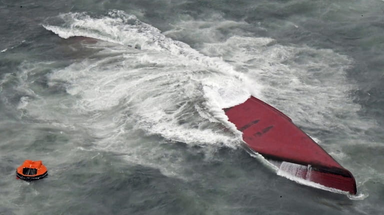A South Korean tanker is seen capsized off Mutsure Island,...