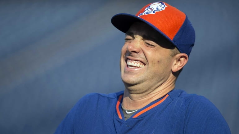 New York Mets third baseman David Wright laughs during warmups...