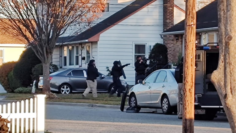Nassau County police at scene of a standoff with a...