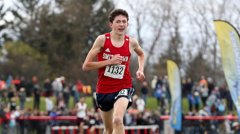 Smithtown's Douglas Antaky finishes the boys Class A race at the...