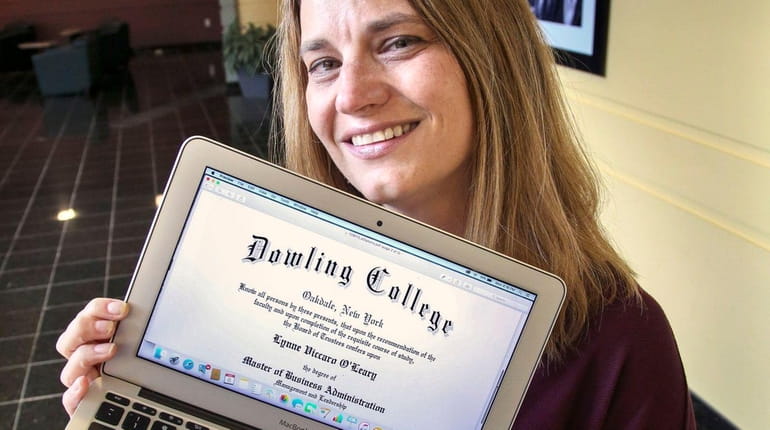 Lynne Viccaro O'Leary, of East Northport, shows the Dowling College...