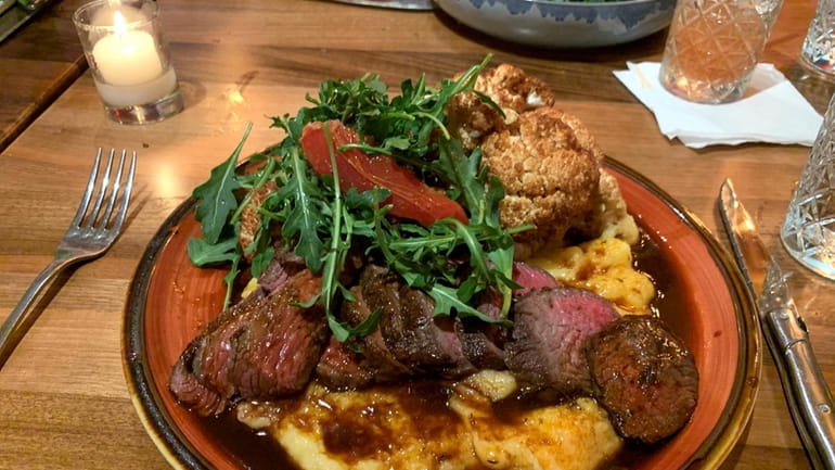 Beef tenderloin with roasted cauliflower and polenta at Casarecce in...