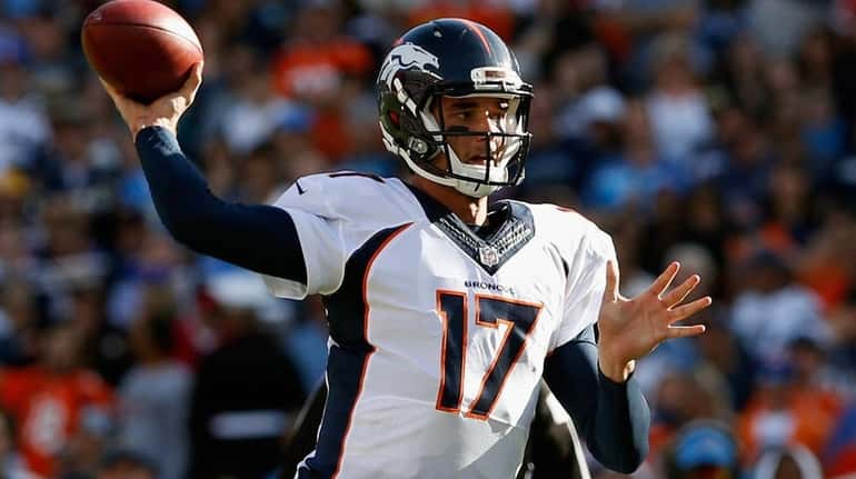 Brock Osweiler of the Denver Broncos passes the ball during...