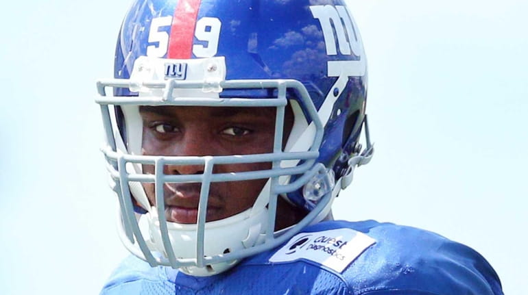 New York Giants linebacker Devon Kennard #59 looks on during...