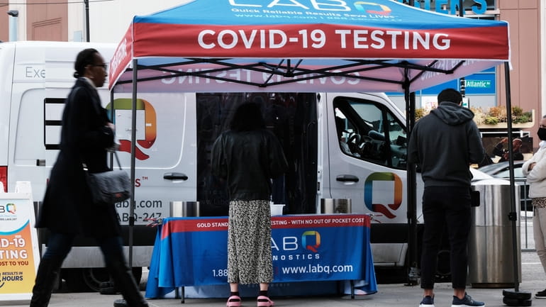A COVID-19 testing site is set up at a Brooklyn...