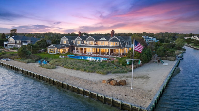 This 20-room estate on Moriches Bay in Remsenburg is on the...