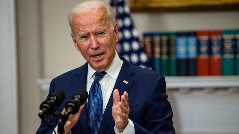 President Joe Biden speaks in the Roosevelt Room of the...
