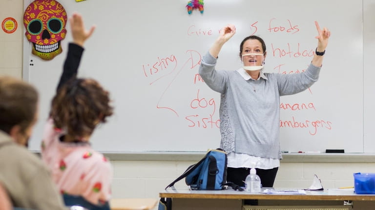 Laura Anderson teaches American Sign Language at Half Hollow Hills High...