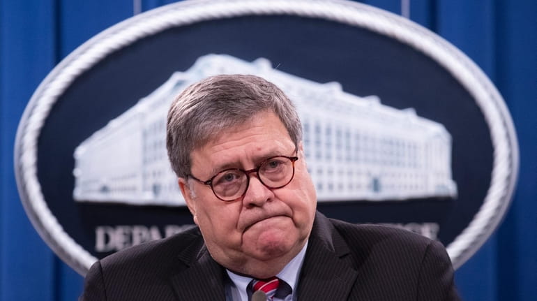 Attorney General William Barr speaks during a news conference, Monday,...