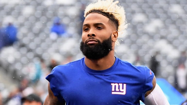 Giants wide receiver Odell Beckham Jr. leaves the field after...