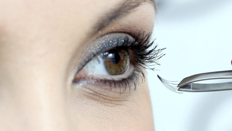 Lash extensions are glued onto individual eyelashes and can stay...