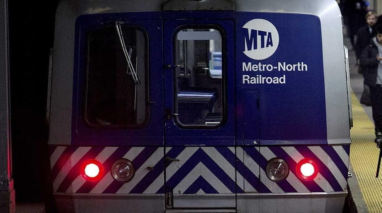 Two Long Islanders are among 13 current and former MTA...