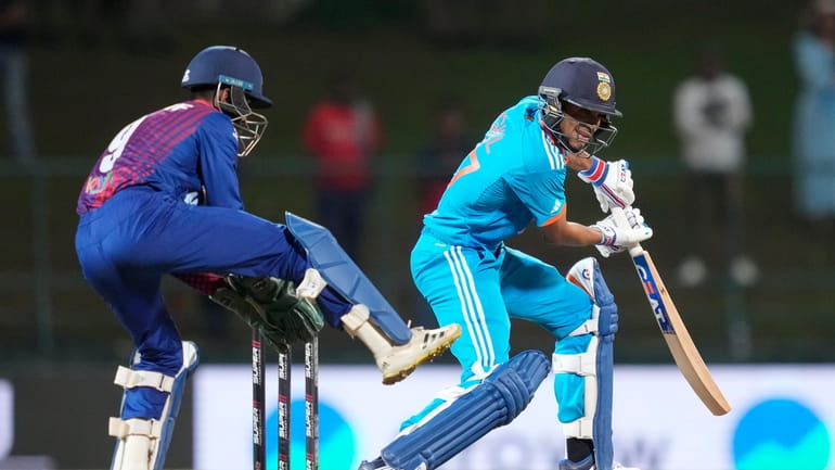 India's Shubman Gill plays a shot during the Asia Cup...