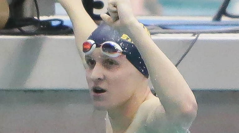 St Anthony's Justin Meyn wins the 100-yard freestyle during the state...