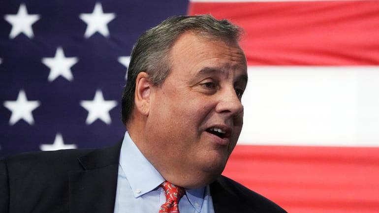 Republican Presidential candidate former, New Jersey Gov. Chris Christie smiles...