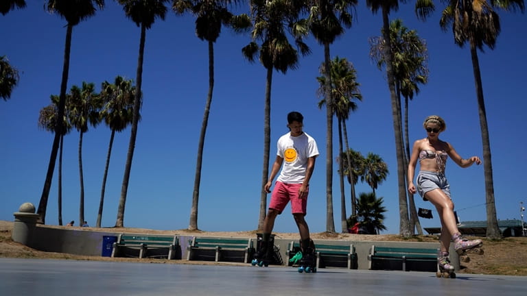 Los Angeles' Venice Beach draws roller skaters, strollers and people-watchers.