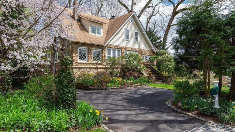 Listed for $988,000, this 3-bedroom, 3-bath Colonial in Roslyn Heights,...