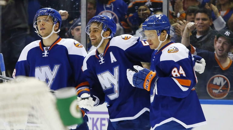 Frans Nielsen #51 of the New York Islanders celebrates his...