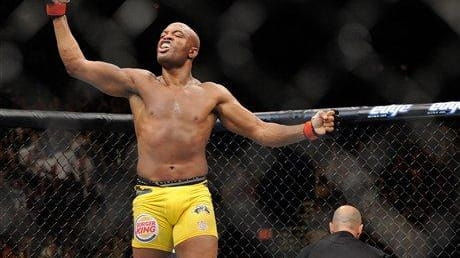 Anderson Silva celebrates after the referee stopped the fight in...