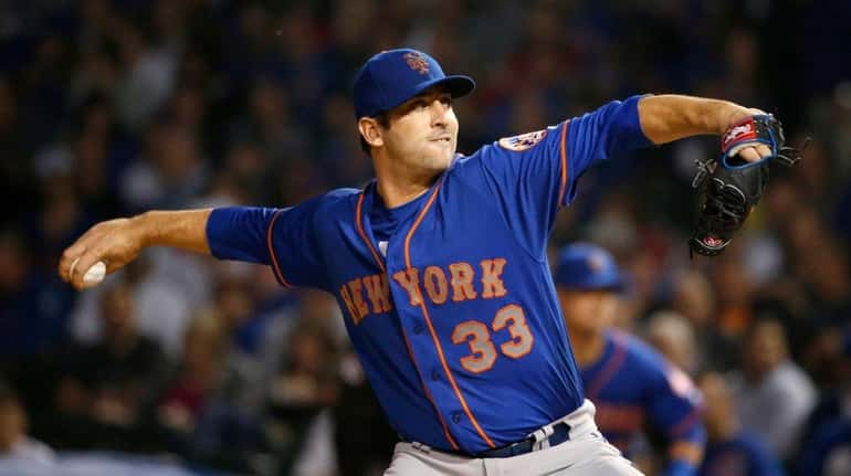 Mets starter Matt Harvey delivers during the first inning of...