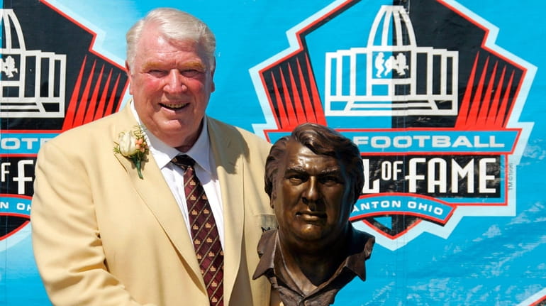Broadcaster and former Oakland Raiders coach John Madden poses with...
