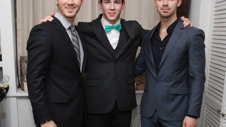 From left, Jonas Brothers Kevin Jonas, Nick Jonas and Joe...