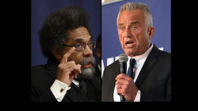 Cornel West, right, speaks at the National Press Club on...
